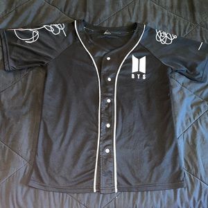 BTS (K-pop) jersey with names and logo.